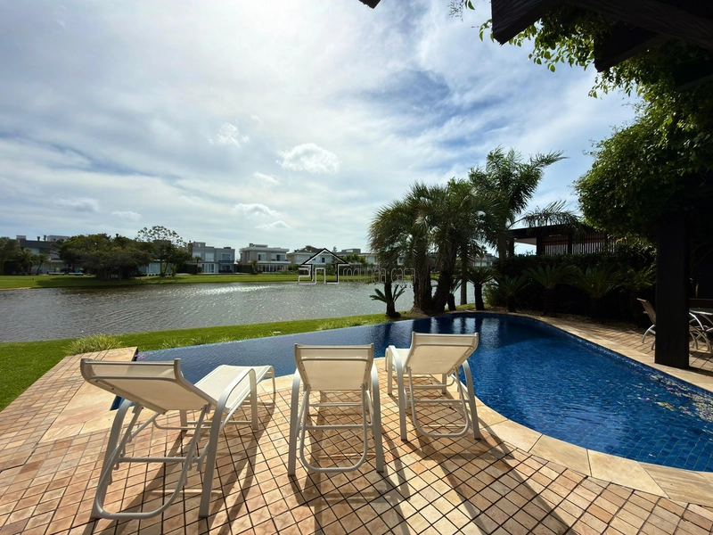 Sobrado beira lago à venda no Condomínio Bosques de Atlântida, em Xang: 58ª foto da galeria de imagens do imóvel