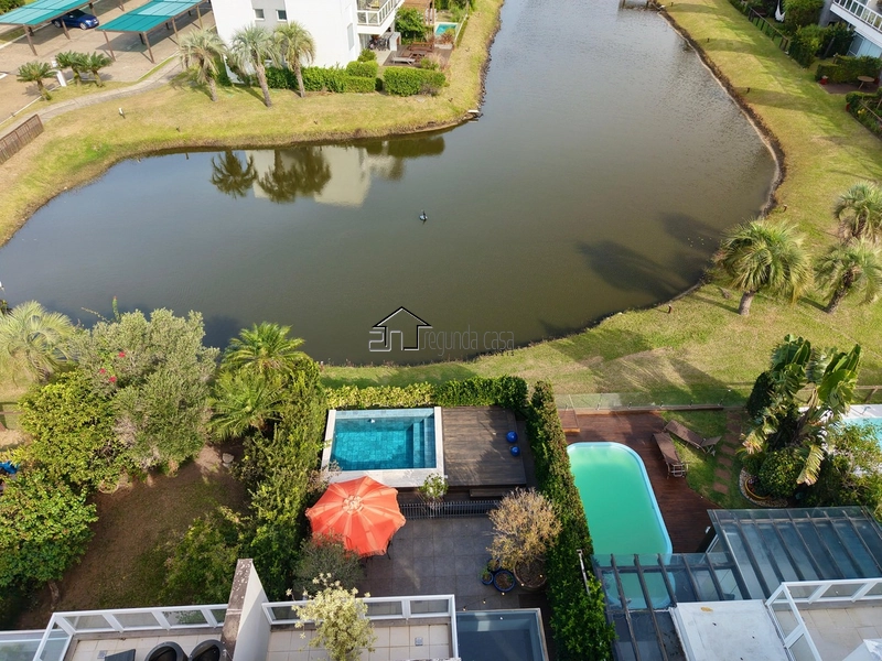 Casa beira lago à venda no Condomínio Rossi, em Atlântida: 6ª foto da galeria de imagens do imóvel