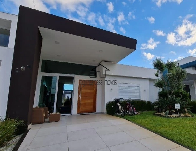Incrível casa composta por 4 suítes: 1ª foto da galeria de imagens do imóvel