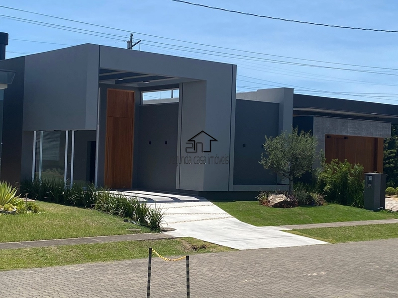 Bela casa à venda no condomínio fechado Capão Ilhas Resort: 1ª foto da galeria de imagens do imóvel