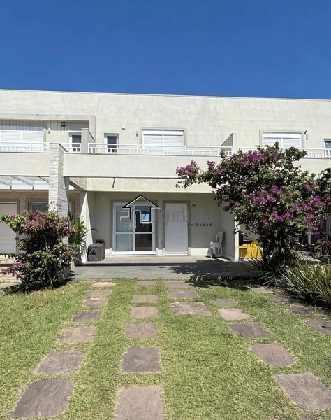 Sobrado em condomínio fechado em Xangri-lá: 2ª foto da galeria de imagens do imóvel