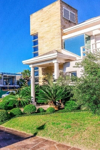 Casa Condomínio fechado de 6 dormitórios em Xangri-lá.: 2ª foto da galeria de imagens do imóvel