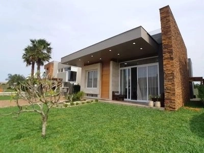 Casa térrea mobiliada em condomínio fechado Villagio de Atlântida: 2ª foto da galeria de imagens do imóvel