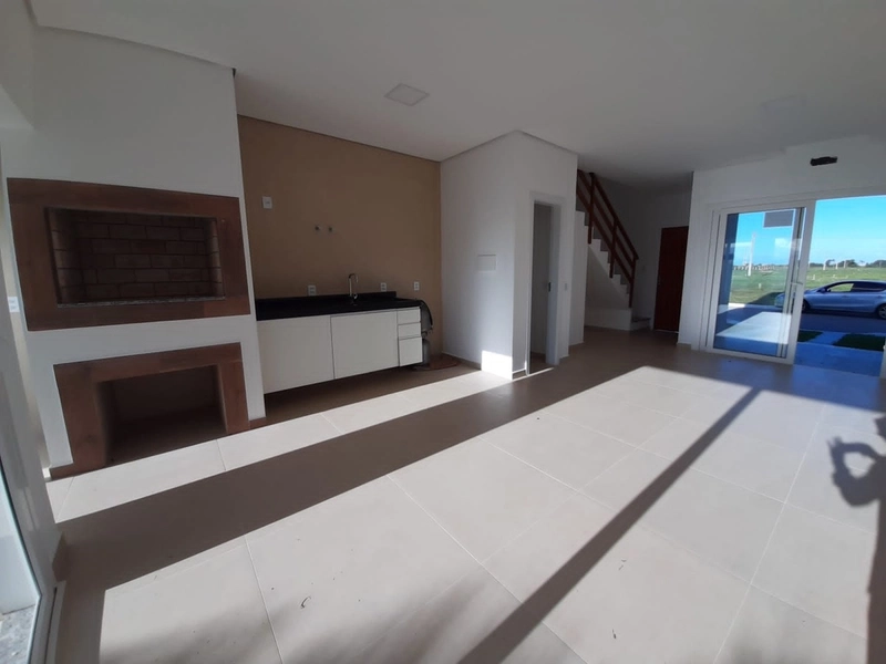 Casa 3 dormitórios no centro de Xangri-lá: 2ª foto da galeria de imagens do imóvel