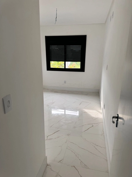 Lindo sobrado 4 dormitórios a apenas 4 quadras do mar em Xangri-lá: 7ª foto da galeria de imagens do imóvel