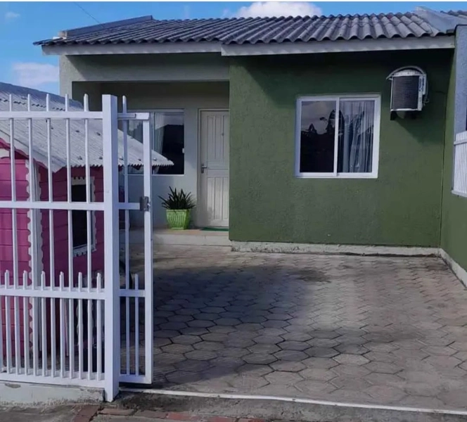 Casa geminada de 2 dormitórios na praia de Atlântida Sul!!: 1ª foto da galeria de imagens do imóvel