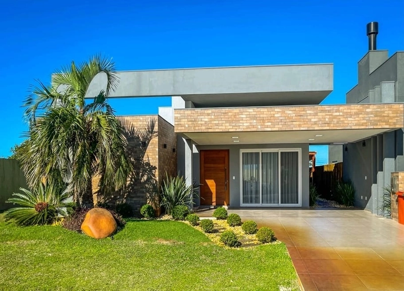Linda casa 4 suítes no condomínio Riviera em Xangri-lá: 1ª foto da galeria de imagens do imóvel