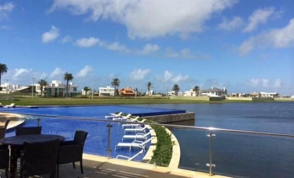 Excelente lote á beira lago no Condomínio Enseada lagos de Xangri-lá: 7ª foto da galeria de imagens do imóvel