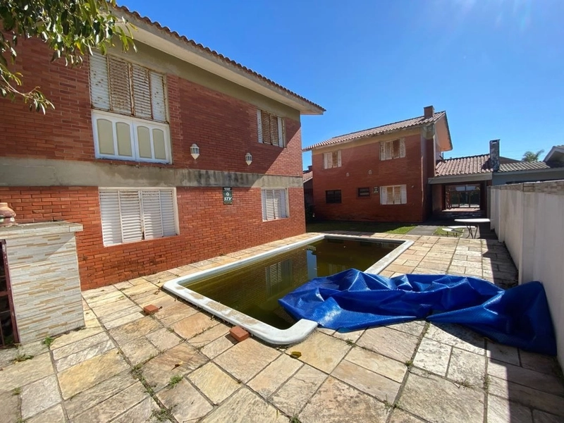 Ótimo sobrado a venda com piscina no centro da praia de Xangri-Lá: 17ª foto da galeria de imagens do imóvel