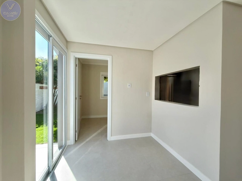 CASA TÉRREA NO CENTRO DE XANGRI-LÁ, FRENTE LESTE, DIVISA COM ATLÂNTIDA: 7ª foto da galeria de imagens do imóvel