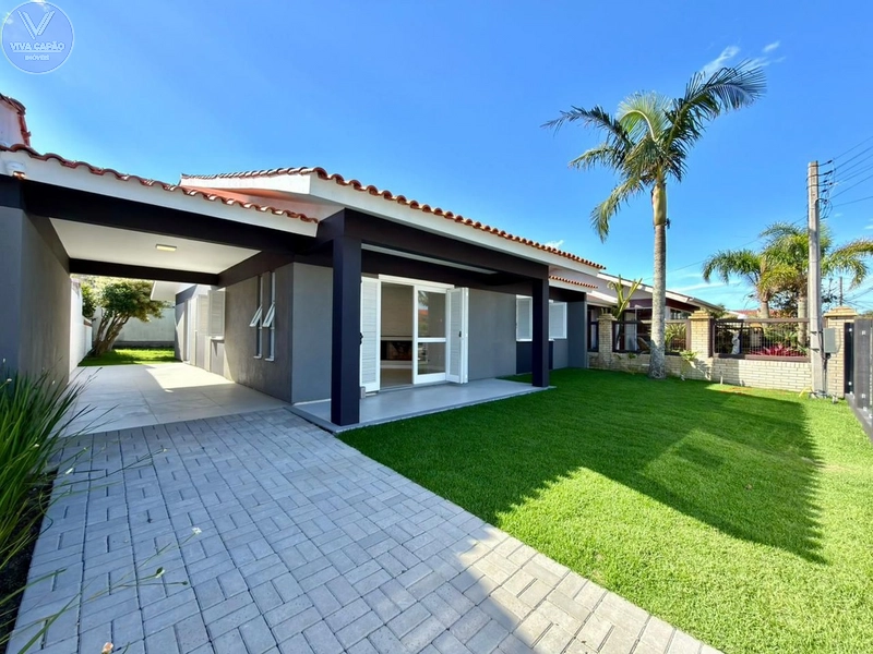 CASA TÉRREA NO CENTRO DE XANGRI-LÁ, FRENTE LESTE, DIVISA COM ATLÂNTIDA: 1ª foto da galeria de imagens do imóvel