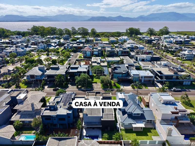 Casa nova em Condomínio de Luxo á Beira da lagoa em Capão da Canoa: 3ª foto da galeria de imagens do imóvel