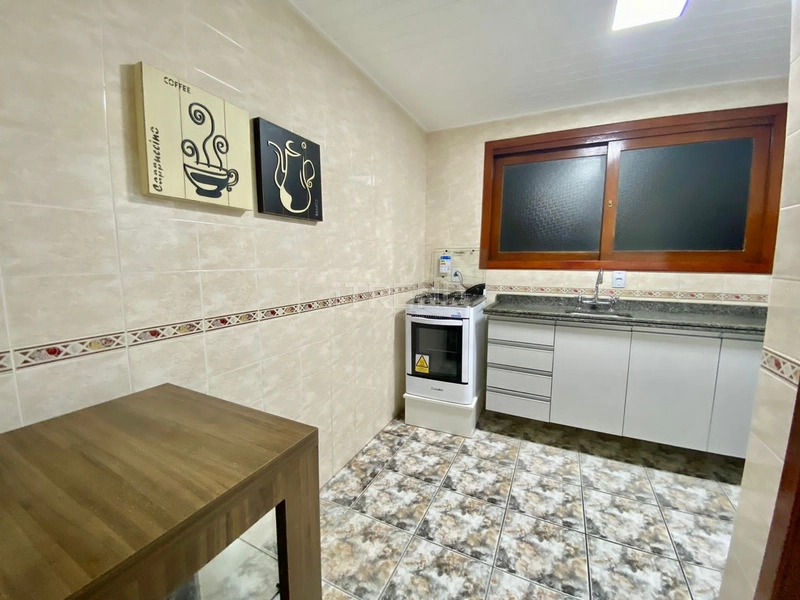 PRÉDIO NA BEIRA MAR DE CAPÃO DA CANOA: 11ª foto da galeria de imagens do imóvel