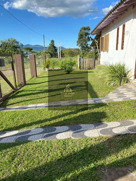 CASA DE ESQUINA NO CENTRO DE TERRA DE AREIA: 5ª foto da galeria de imagens do imóvel