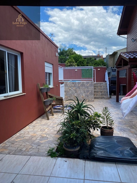 LINDA CASA DE MADEIRA COM PISCINA – TORRES/RS: 9ª foto da galeria de imagens do imóvel