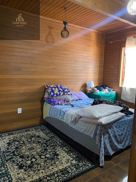 LINDA CASA DE MADEIRA COM PISCINA – TORRES/RS: 19ª foto da galeria de imagens do imóvel