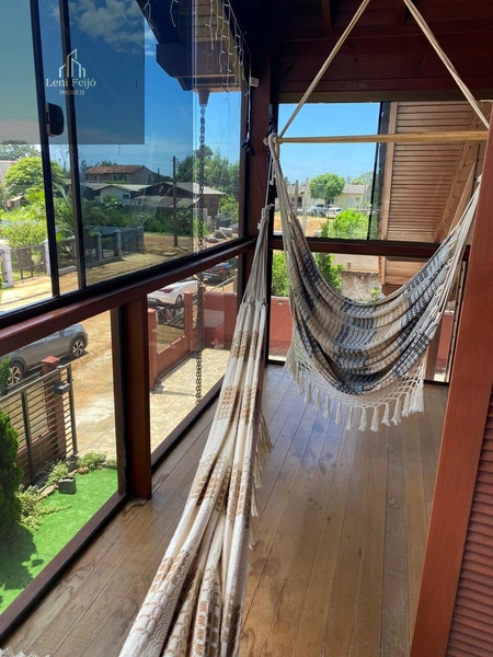 LINDA CASA DE MADEIRA COM PISCINA – TORRES/RS: 14ª foto da galeria de imagens do imóvel