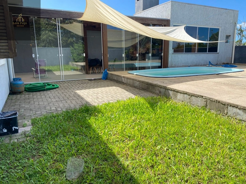 Casa com 2 dormitórios e piscina aquecida.: 3ª foto da galeria de imagens do imóvel