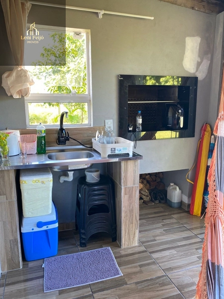 Casa mista no centro de Terra de Areia: 2ª foto da galeria de imagens do imóvel