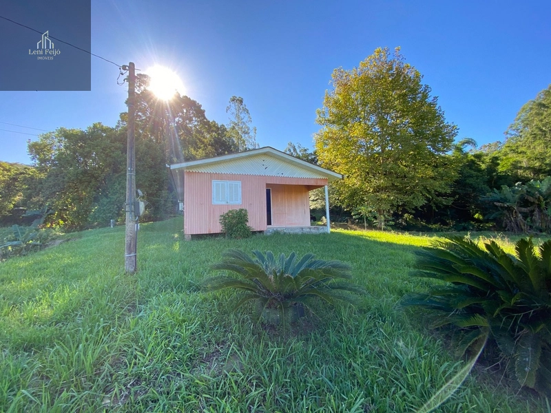 Área rural 10,7ha com casa e bananal perto do centro: 2ª foto da galeria de imagens do imóvel