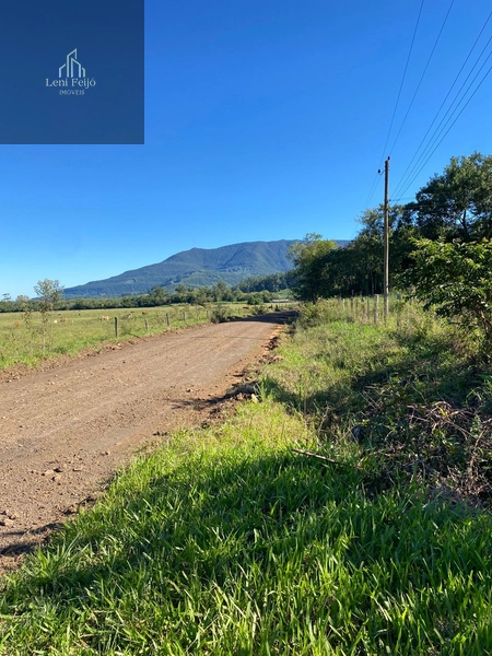Área rural 10,7ha com casa e bananal perto do centro: 3ª foto da galeria de imagens do imóvel