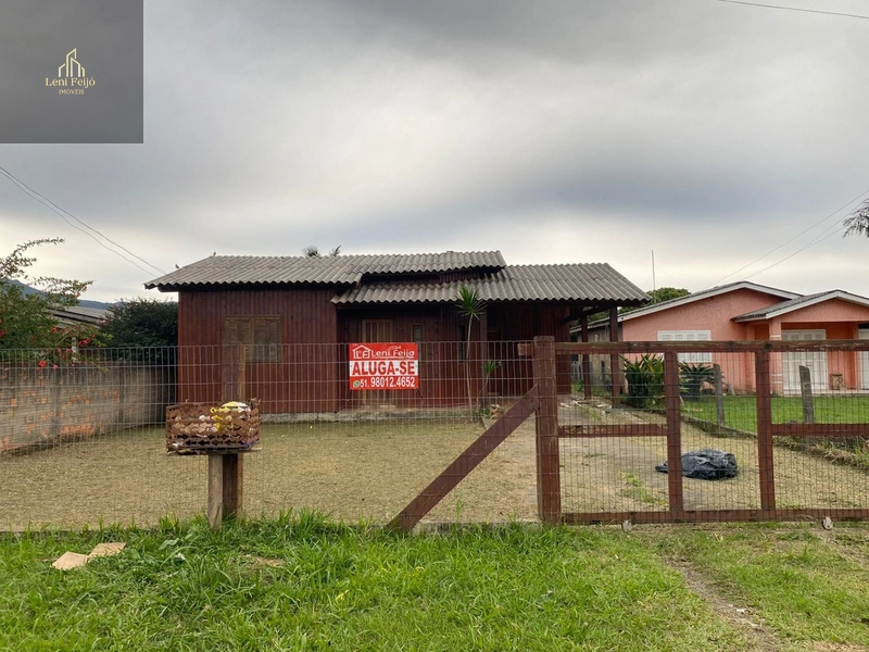 Casa de madeira para aluguel no centro em Terra de Areia/RS: 2ª foto da galeria de imagens do imóvel
